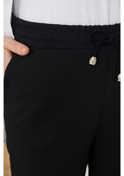 Kadın Havuç Kesim Bilek Boy Ip Detaylı Cepli Beli Lastikli Kumaş Pantolon fiyatları