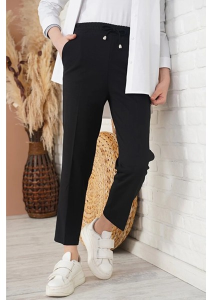 Kadın Havuç Kesim Bilek Boy Ip Detaylı Cepli Beli Lastikli Kumaş Pantolon modelleri