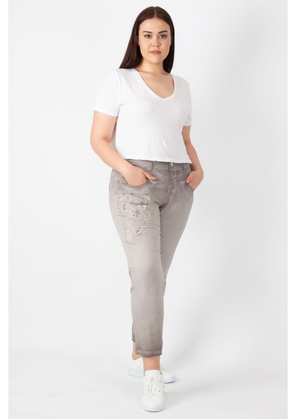 Kadın Taş Batik Yıkama Efektli Aplike Nakışlı Bilek Boy Pantolon 65N29833 fırsatları
