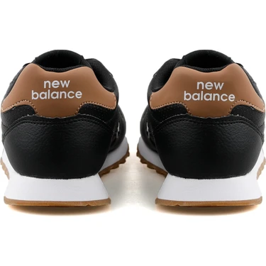 New balance 373 womens black and gold sales