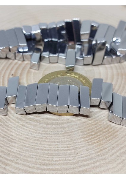 Hematit Taşı Dikdörtgen Çift Delikli Yarım Dizi 4,5*12 mm (36780) (18 cm Uzunluğundadır) fiyatları