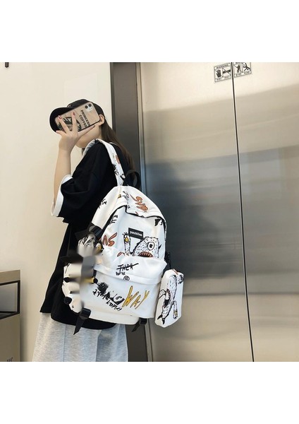 Sokak Trendi Ortaokul Öğrencileri Kişilik Grafiti Büyük Kapasiteli Seyahat Sırt Çantası (Yurt Dışından) fırsatları
