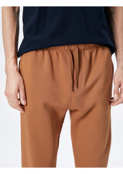 Jogger Eşofman Altı Beli Bağcıklı Cep Detaylı İşlemeli