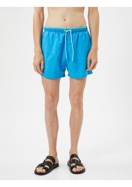 Deniz Şortu Kısa Beli Bağcıklı Cepli modelleri