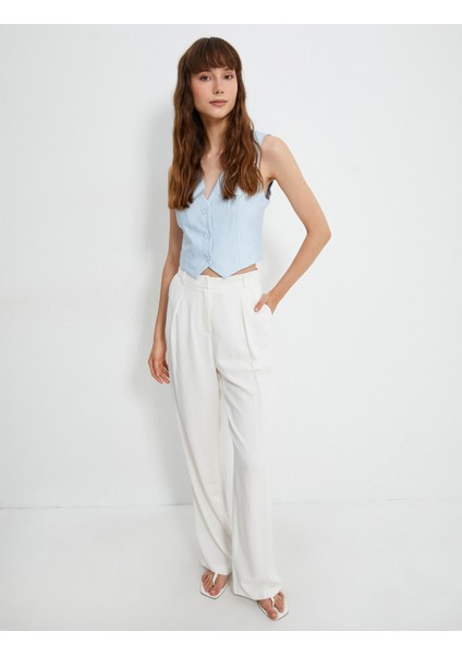 Melis Ağazat x Koton - Düğmeli V Yaka Yelek fiyatları