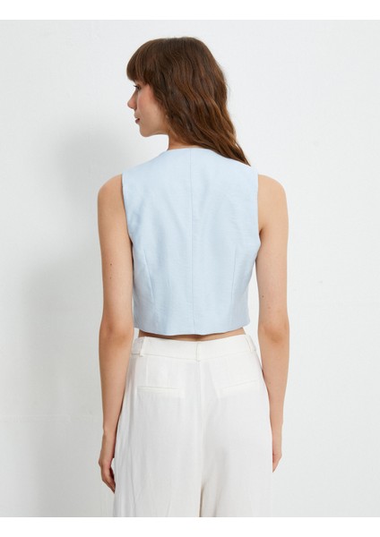 Melis Ağazat x Koton - Düğmeli V Yaka Yelek fırsatları