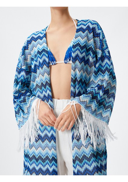Kimono Kolları ve Eteği Püsküllü Rahat Kesim indirimleri