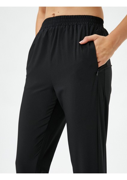 Jogger Eşofman Altı Beli ve Paçası Lastikli Fermuarlı Cepli