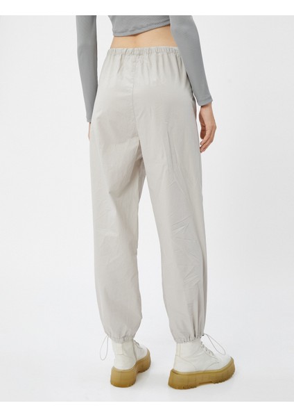 Paraşüt Pantolon Cepli Pamuklu Beli ve Paçaları Lastikli Stoperli fırsatları
