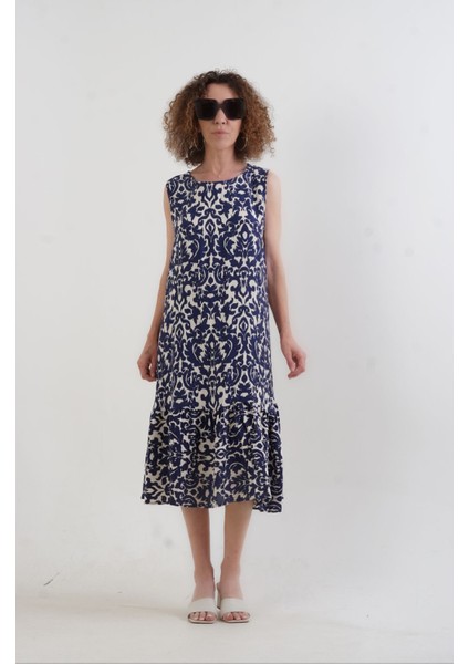 Lacivert Desenli Eteği Volanlı Kolsuz Elbise