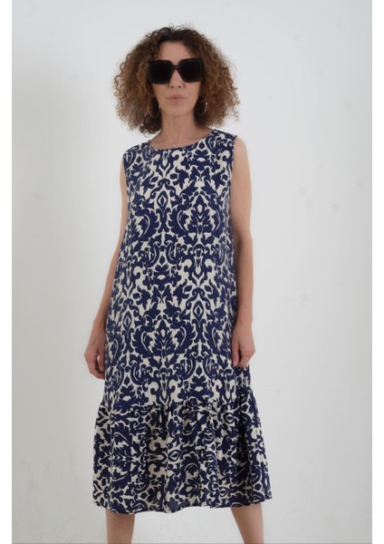Lacivert Desenli Eteği Volanlı Kolsuz Elbise fiyatları