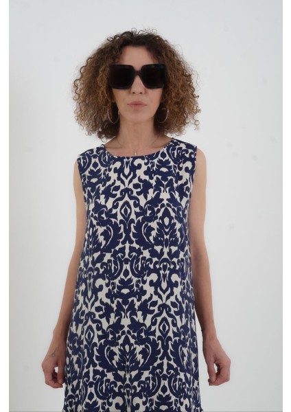 Lacivert Desenli Eteği Volanlı Kolsuz Elbise fırsatları