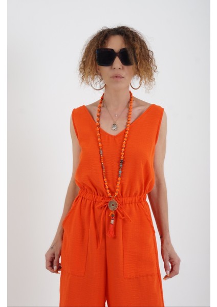 Nar Çiçeği Ön Arka V Yaka Geniş Paça Tulum fırsatları