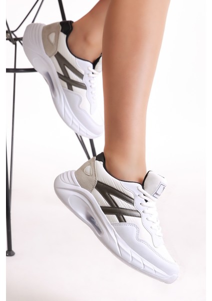 Kadın Beyaz Siyah Faylon Taban Şeritli Bağcıklı Spor Ayakkabı modelleri