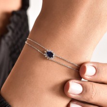 Delagos 0,40 Karat Mavi Safir ve 0,02 Karat Beyaz Pırlantalı 14 Ayar Beyaz Altın Bilezik