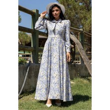 Küçüğüm Butik Tesettür Mavi Pastel  Çiçekli Boyundan Bağlamalı Kloş Elbise