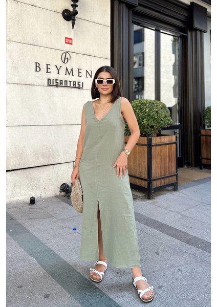 Haki Askılı Ithal Müslin Kumaş, Önü ve Arkası V Yaka, Önden Yırtmaçlı, Maksi/uzun Salaş Elbise modelleri