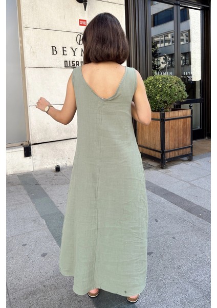 Haki Askılı Ithal Müslin Kumaş, Önü ve Arkası V Yaka, Önden Yırtmaçlı, Maksi/uzun Salaş Elbise indirimleri