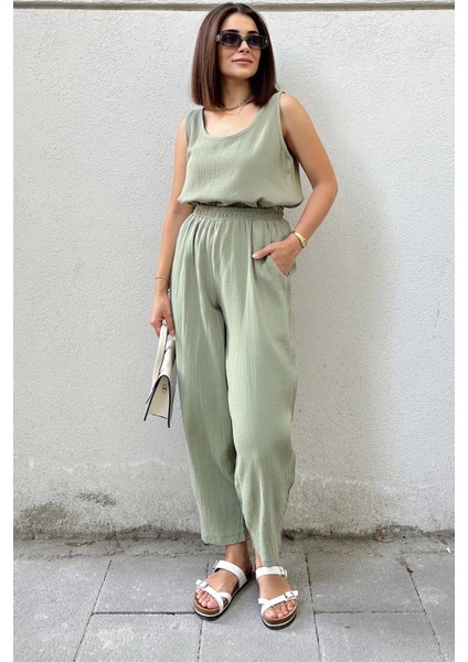 Haki Ithal Müslin Kumaş, Beli Lastikli,Cepli Rahat Kalıp Pantolon - Tesettüre Uygun