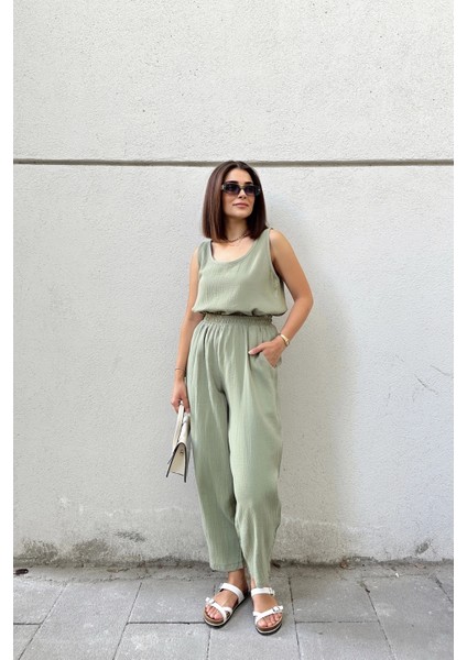 Haki Ithal Müslin Kumaş, Beli Lastikli,Cepli Rahat Kalıp Pantolon - Tesettüre Uygun modelleri
