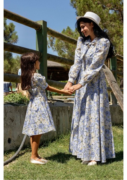 Tesettür Mavi Pastel Çiçekli Boyundan Bağlamalı Kloş Anne Kız Kombini (Tekli Satılmaktadır) fiyatları