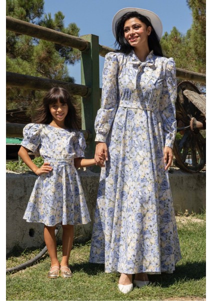 Tesettür Mavi Pastel Çiçekli Boyundan Bağlamalı Kloş Anne Kız Kombini (Tekli Satılmaktadır) modelleri