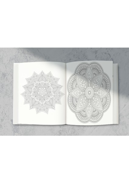 Mandala Sanatının Büyüsü: 24 Özel Desenle Dolu Perforajlı Boyama Kitabı! fırsatları