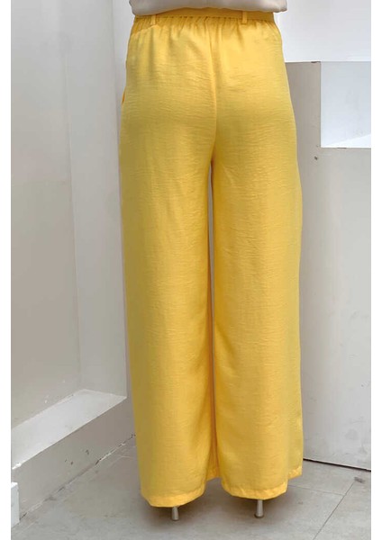 Bym Düğme Detaylı Bel Bağlamalı Cepli Bol Pantolon 0275 Sarı fiyatları