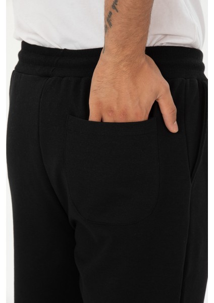 Erkek Basic Regular Fit Paçası Ribanalı Jogger Eşofman Altı indirimleri