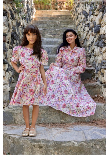 Tesettür Turuncu Pastel Çiçekli Boyundan Bağlamalı Kloş Anne Kız Kombini (Tekli Satılmaktadır) modelleri