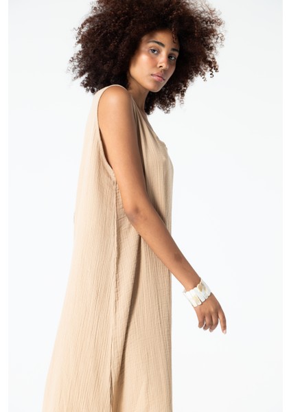 Bej Derin Yaka Kalın Askılı Asimetrik Kesim Salaş Müslin Doğal Kumaş Elbise fiyatları