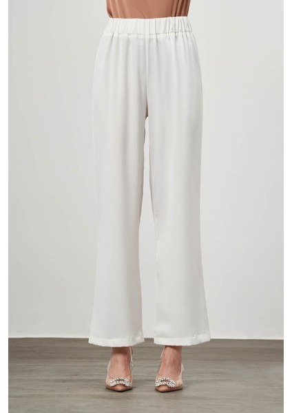 Beli Lastikli Saten Ekru Pantolon fiyatları