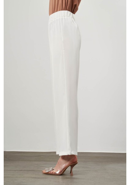 Beli Lastikli Saten Ekru Pantolon modelleri