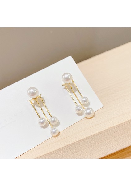 Uzun Püsküllü Mizaçlı Inci Telleri Küpe (Yurt Dışından) fiyatları