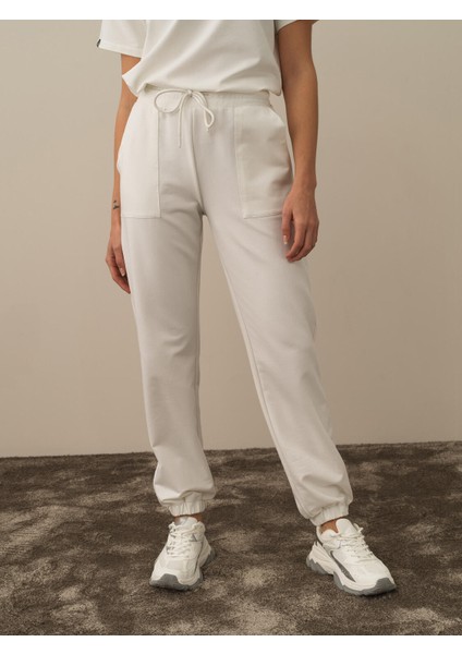 Kadın Kırık Beyaz Pamuk Dokulu Regular Fit Sweat Pantolon fiyatları