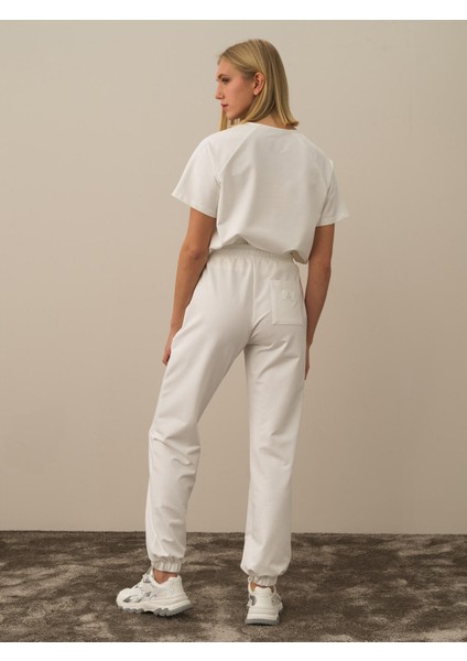Kadın Kırık Beyaz Pamuk Dokulu Regular Fit Sweat Pantolon fırsatları