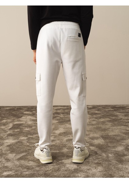 Erkek Kırık Beyaz Pamuk Dokulu Regular Fit Sweat Pantolon fırsatları