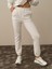 Kadın Kırık Beyaz Pamuk Dokulu Regular Fit Sweat Pantolon 2
