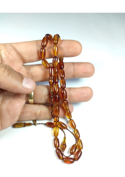 Ayhan Turan Usta Işi Imzalı 0.6 mm Şeffaf Delim Sıkma Kehribar Model No 3245 indirimleri