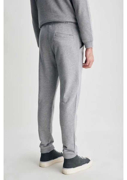 Luskın Gri Daralan Kesim Baskılı Standard Fit Erkek Eşofman Alt fırsatları