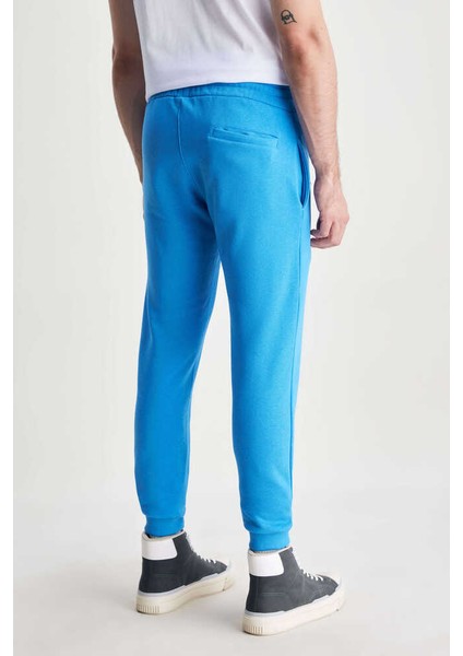 Otto Mavi Rahat Paça Nakışlı Standard Fit Erkek Eşofman Alt fırsatları