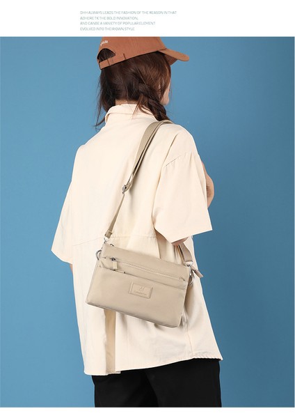 Messenger Çanta Bayan Büyük Kapasiteli Çok Katmanlı Omuz Çantası Japon Basit Vahşi Su Geçirmez Çanta (Yurt Dışından) fiyatları