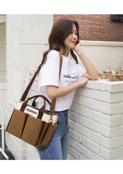 Anne Çantası Yeni Japon ve Kore Taşınabilir Çapraz Çapraz Çok Fonksiyonlu Anne Çantası Işe Gitmek Için Taşınabilir Büyük Kapasiteli Anne Bebek Çantası (Yurt Dışından) fiyatları