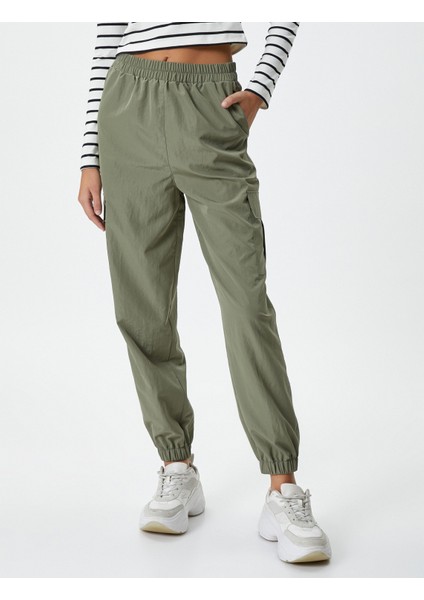 Kargo Pantolon Beli ve Paçası Lastikli Kapaklı Cepli modelleri