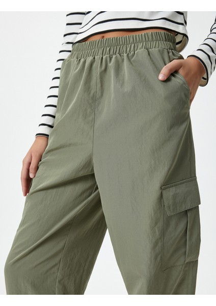 Kargo Pantolon Beli ve Paçası Lastikli Kapaklı Cepli indirimleri
