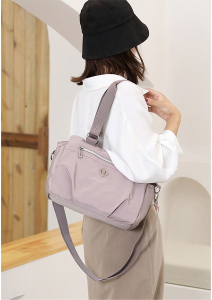 Kadın Çantası Yeni Moda Trendi Omuzdan Askili Çanta Büyük Kapasiteli Çok Katmanlı Taşınabilir Eğik Sırt Çantası Basit Seyahat Koltuk Altı Çantası (Yurt Dışından) fiyatları