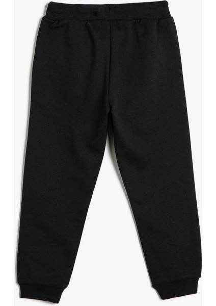 Jogger Eşofman Altı Beli Bağlamalı Cepli Slogan Baskılı Şardonlu fiyatları