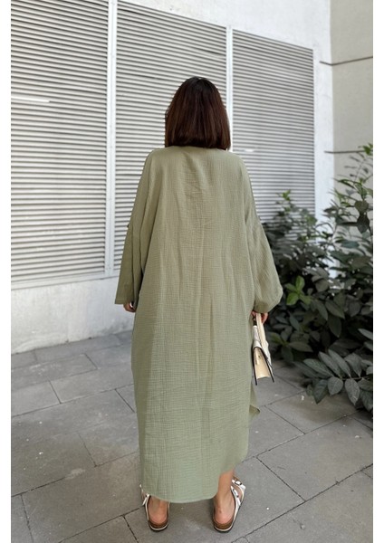 Kadın Haki Muslin Kumaş, Yarasa Kol, Eteği Oval, Çift Cepli, Uzun Oversize Salaş Gömlek Elbise fiyatları