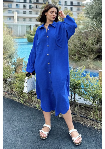 Kadın Saks Muslin Kumaş, Yarasa Kol, Eteği Oval, Çift Cepli, Uzun Oversize Salaş Gömlek Elbise