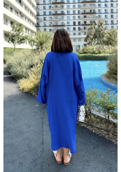 Kadın Saks Muslin Kumaş, Yarasa Kol, Eteği Oval, Çift Cepli, Uzun Oversize Salaş Gömlek Elbise fiyatları